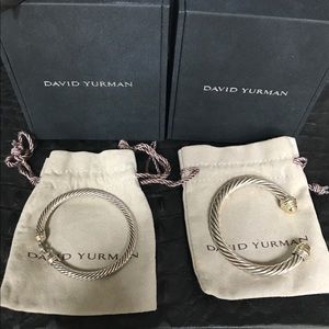 2 David Yurman bracelets.